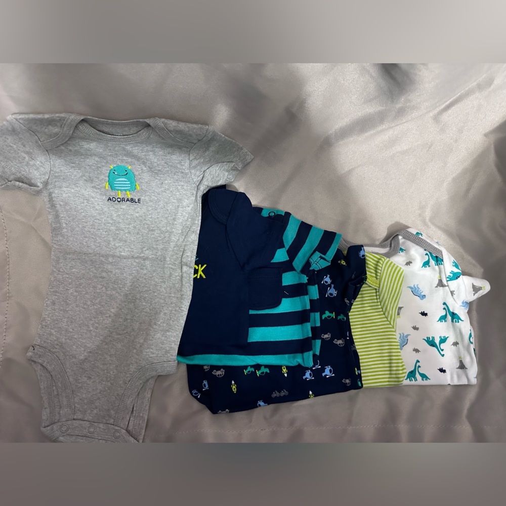 6 short sleeve size 3-6 month baby boy onesies. New never worn. No tags